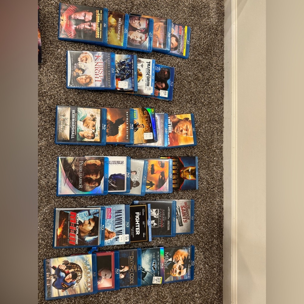 Bin of 29 Blu Rays & 32 DVDs